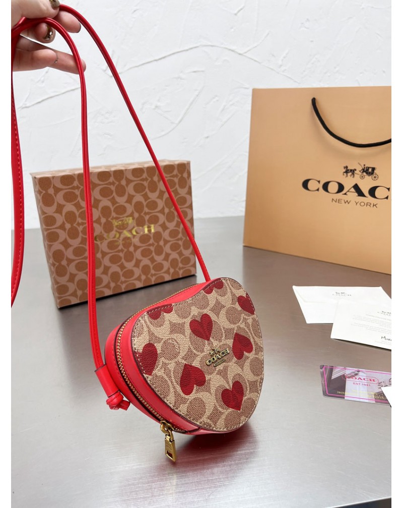 コーチショルダーバッグお洒落心型可愛い斜め掛けバッグファッション大人気 コーチショルダーバッグお洒落心型可愛い斜め掛けバッグファッション大人気